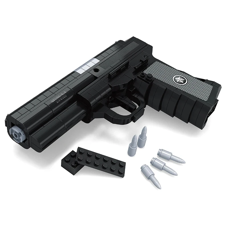 A black toy pistol with a gray star on the handle, four gray bullets, and two black rectangular pieces are displayed.