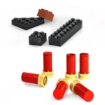 Black, brown, and red toy bricks are arranged on a white surface.