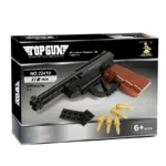 A toy gun made of black and brown bricks is displayed on a box, along with black bricks and gold bullets.