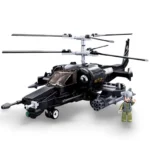 Black toy helicopter with two rotors and a small figure in green uniform.