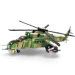 A toy helicopter with green and tan camouflage pattern has black rotors and red missiles.