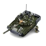 A green toy tank with a long barrel and a small soldier figure standing next to it.