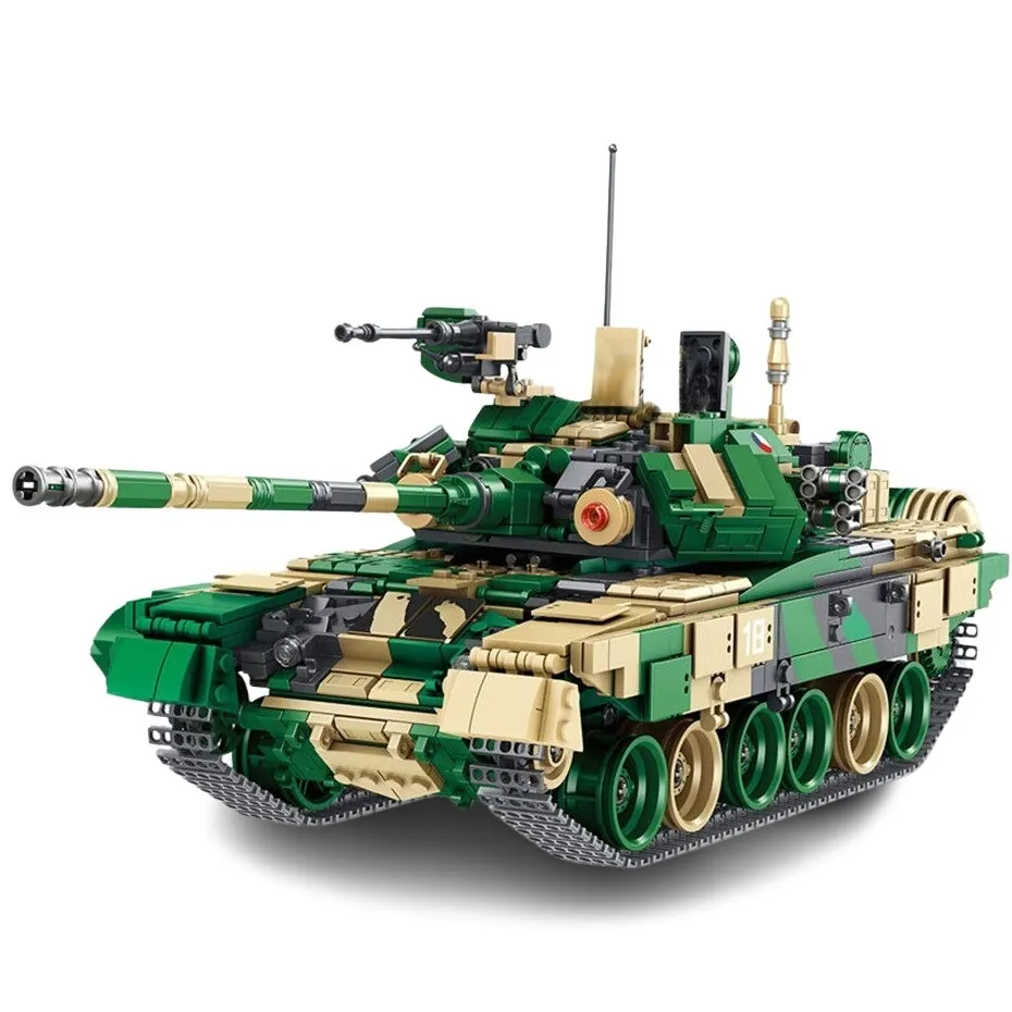 A toy tank with a green and tan camouflage pattern has a long barrel and multiple wheels.