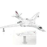 A white toy airplane with a red star on the tail and wing is displayed.