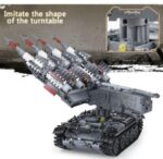 A gray toy tank with multiple missiles attached is displayed.