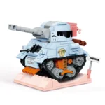 A light blue toy tank with a long cannon and black treads sits on a pink base.