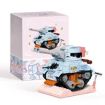 A light blue toy tank with black treads and orange accents sits on a pink base, next to its packaging.