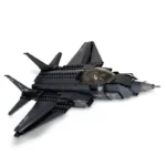 A black toy jet with a transparent cockpit and multiple wings.