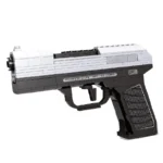 A toy gun with black and white blocks is displayed.