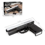 A black and silver toy gun made of building bricks with a box is displayed.