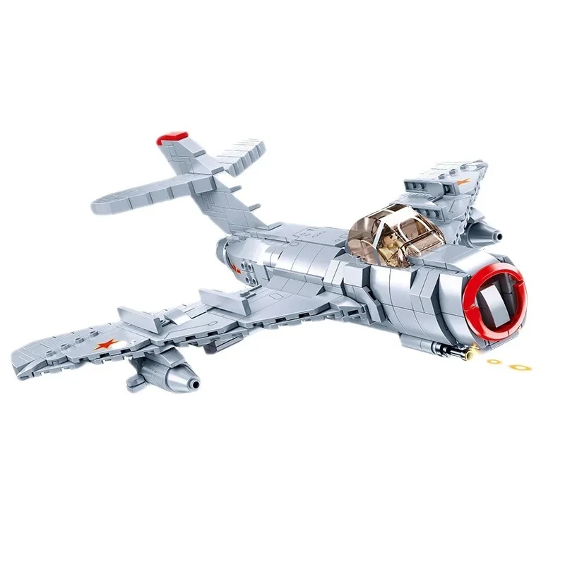 A gray toy airplane with red accents and a transparent cockpit is depicted.