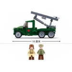 A green truck with a missile launcher and two toy figures are displayed.