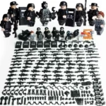 A collection of toy figures, weapons, and accessories are displayed.