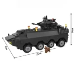 A black brick toy vehicle with six wheels and a small brown dog figure.