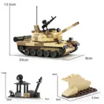 A tan and brown toy tank with a long barrel and small black gun, plus two smaller brick structures.