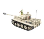 A toy tank with a long barrel and a figure holding a rifle stands on top.