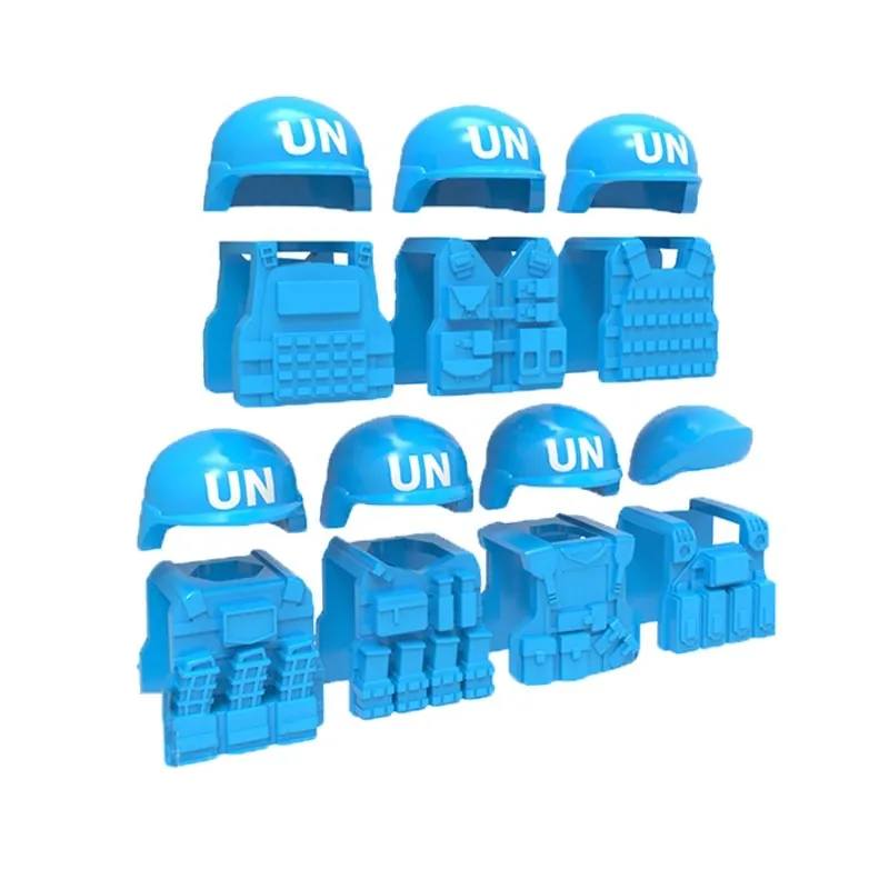 Blue toy helmets and vests with "UN" text are arranged in rows.