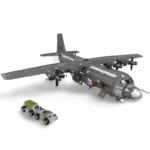 A gray toy airplane and a smaller toy truck with a trailer are displayed.