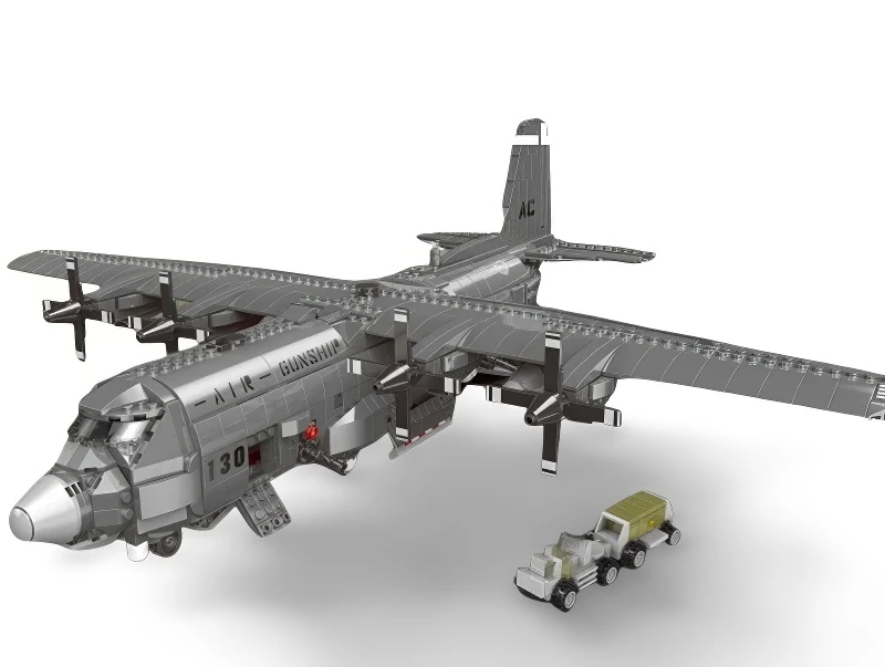 A gray toy airplane with four propellers and a toy truck are visible.