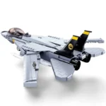 A gray toy fighter jet with black and yellow tail fins is displayed.