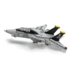 A gray toy airplane with black and yellow accents and a skull and crossbones design on the tail.