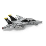 A gray toy jet with black and yellow accents, and a skull and crossbones design on the tail.