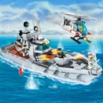 A toy warship and a helicopter with four figures are on the water.