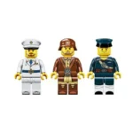 Three toy figures wearing different military uniforms stand side by side.