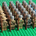 A group of miniature soldier figures standing in formation with rifles.